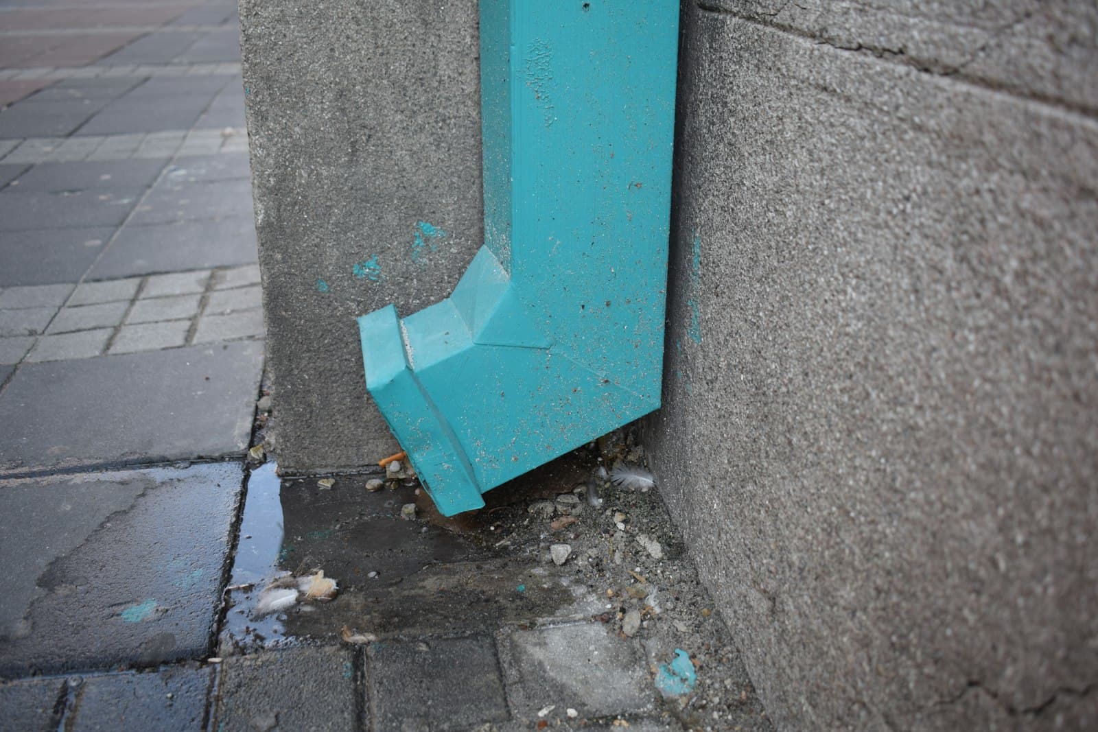Downspout directing water away from a foundation
